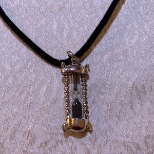 Hourglass necklace 17in velvet cord with hourglass pendant that actually works.